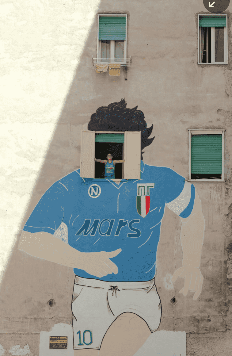Maradona mural in the Quartieri Spagnoli, Naples — a child leans from the window that forms his face